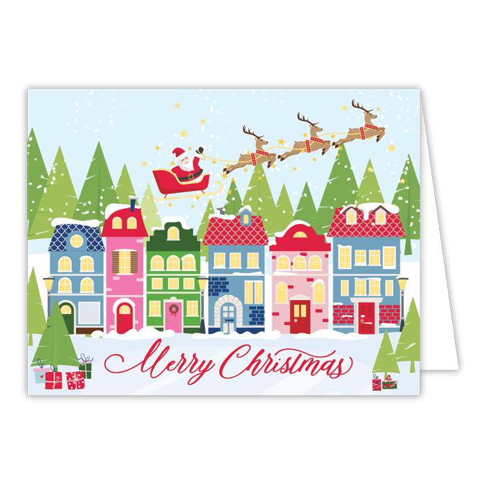 Merry Christmas Santa and Reindeer Flying Over Town Greeting Card